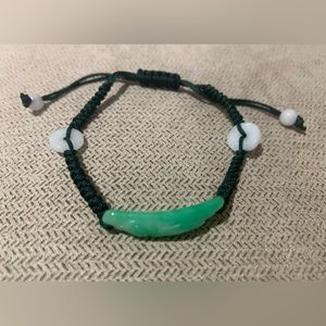 Green and white jade bead cord bracelet.  Adjustable